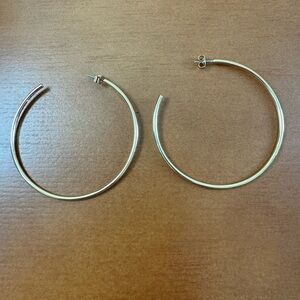 J. Crew thin gold hoop earrings.